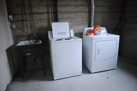 Laundry area at the furnished basement suite
